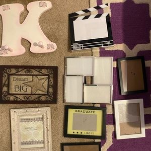 Variety of picture frames and wall hangings